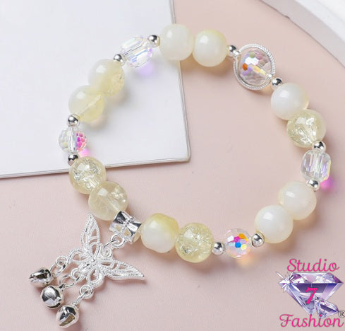 Gilded Glow Butterfly Bell Bracelet
